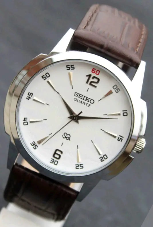 Seiko Quartz Japan Made Stainless Steel Case White Dial Faux Leather Strap Wristwatch - Genuine Vintage Watches