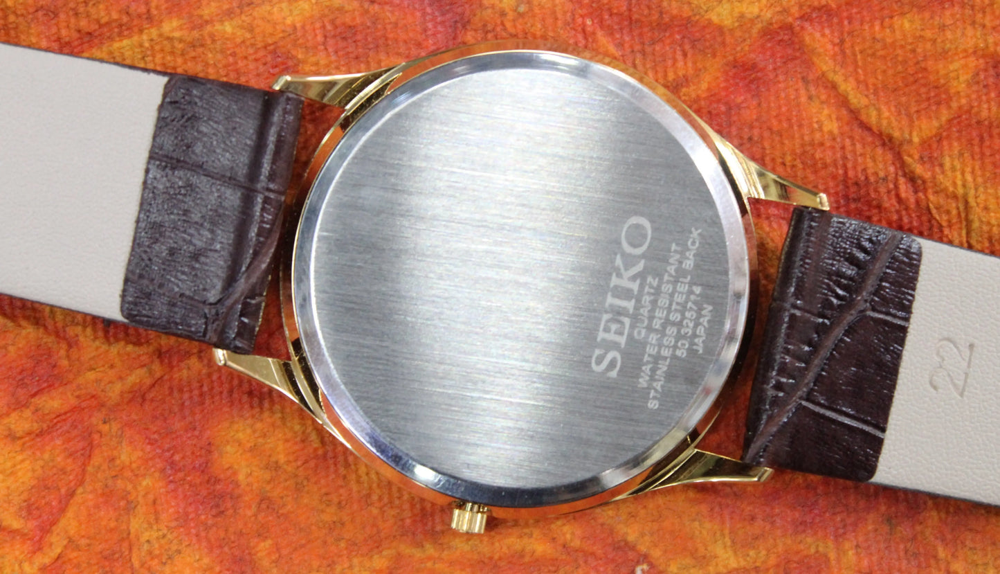 Seiko Quartz Japan Made Super Slim Two Hands Stainless Steel Case Gold Dial Wristwatch - Genuine Vintage Watches