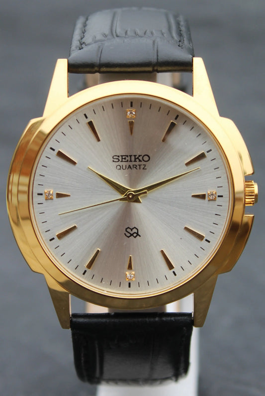 Seiko Quartz Japan Made Gold Plated Case Silver Dial Faux Leather Strap Wristwatch - Genuine Vintage Watches