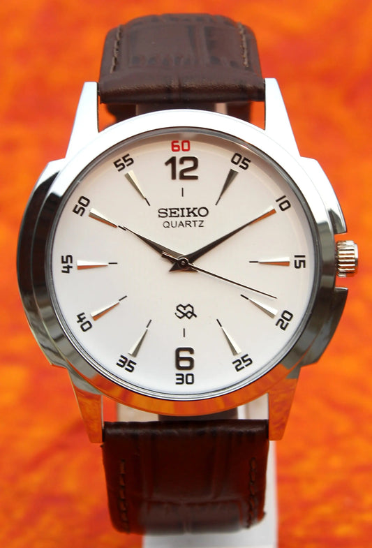 Seiko Quartz Japan Made Gold Plated Case White Dial Faux Leather Strap Wristwatch - Genuine Vintage Watches