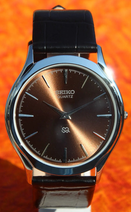 Seiko Quartz Super Slim Two Hands Japan Made Stainless Steel Case Brown Dial Wristwatch - Genuine Vintage Watches