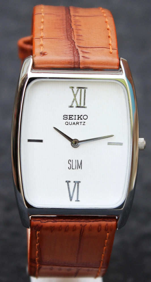 Seiko Quartz Super Slim Two Hands Japan Made Stainless Steel Case White Dial Wristwatch - Genuine Vintage Watches